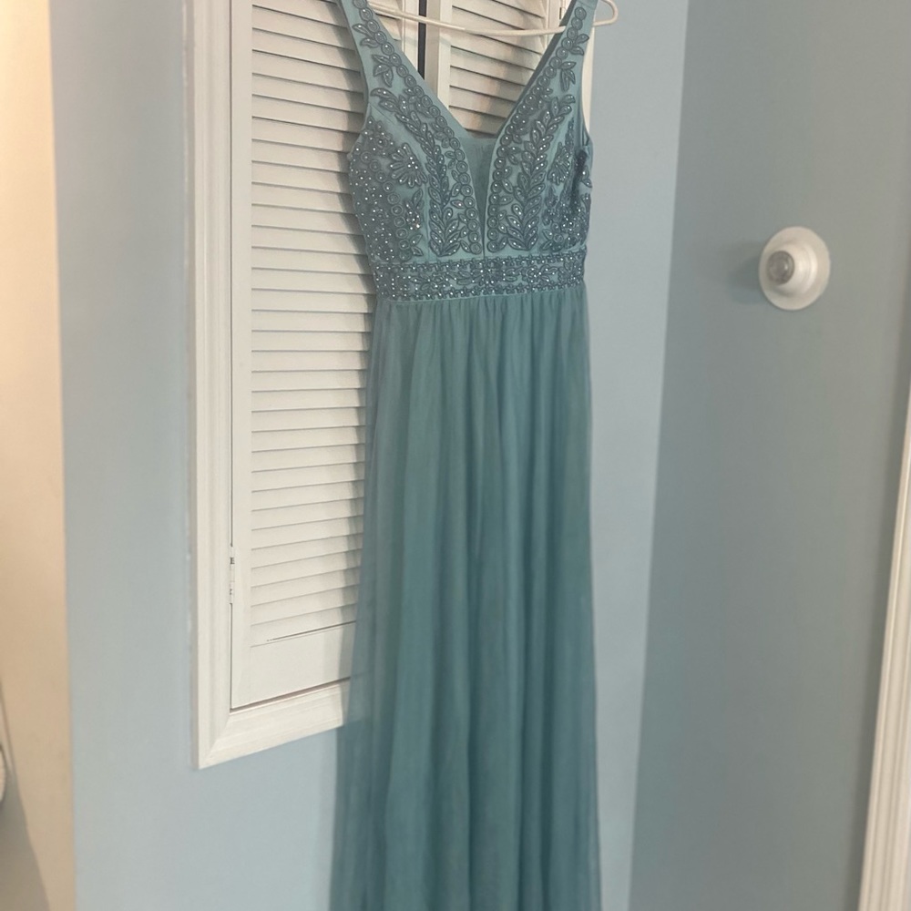 Beautiful dress. Worn only one time for a wedding.